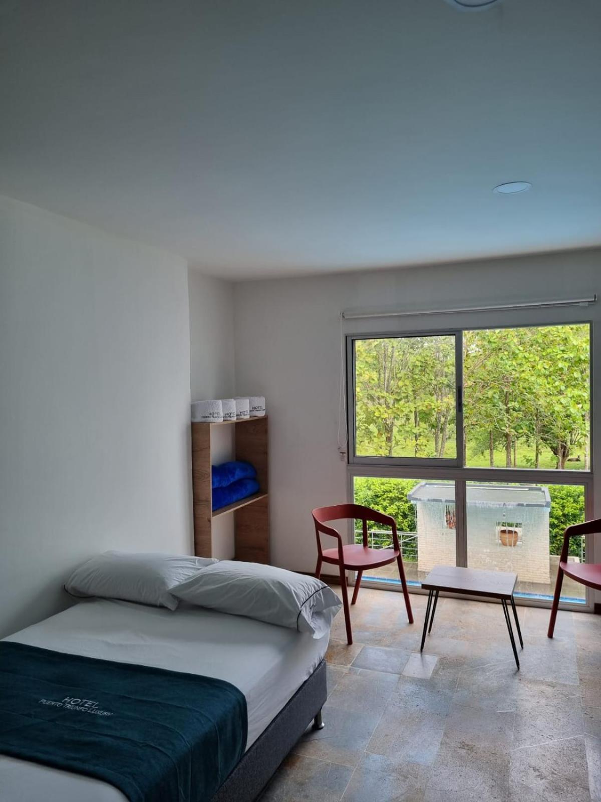 Hotel Puerto Triunfo Doradal Bagian luar foto