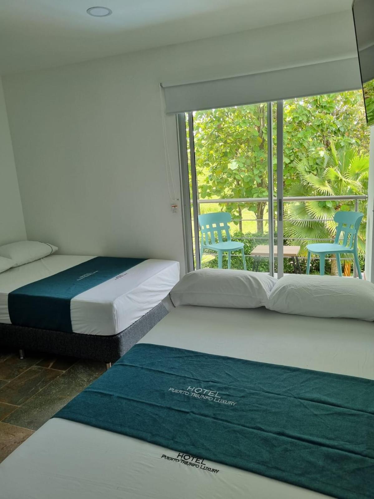 Hotel Puerto Triunfo Doradal Bagian luar foto
