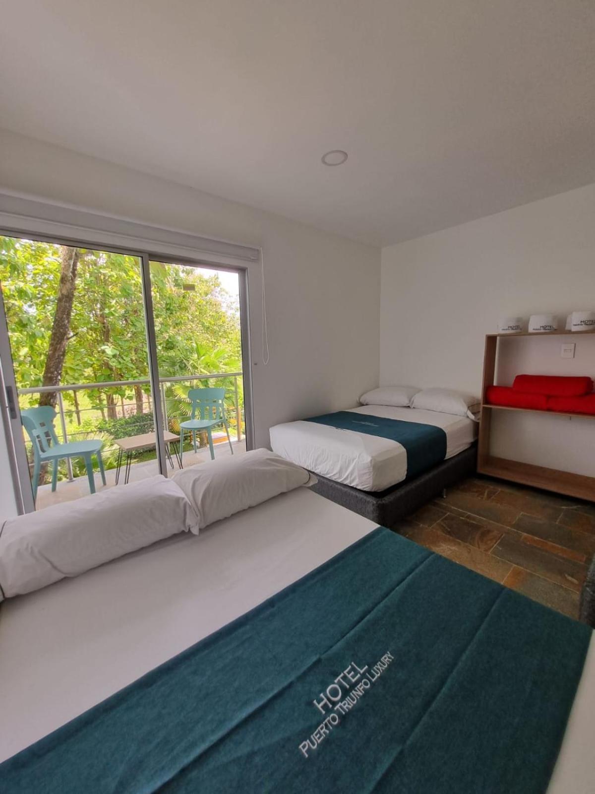 Hotel Puerto Triunfo Doradal Bagian luar foto