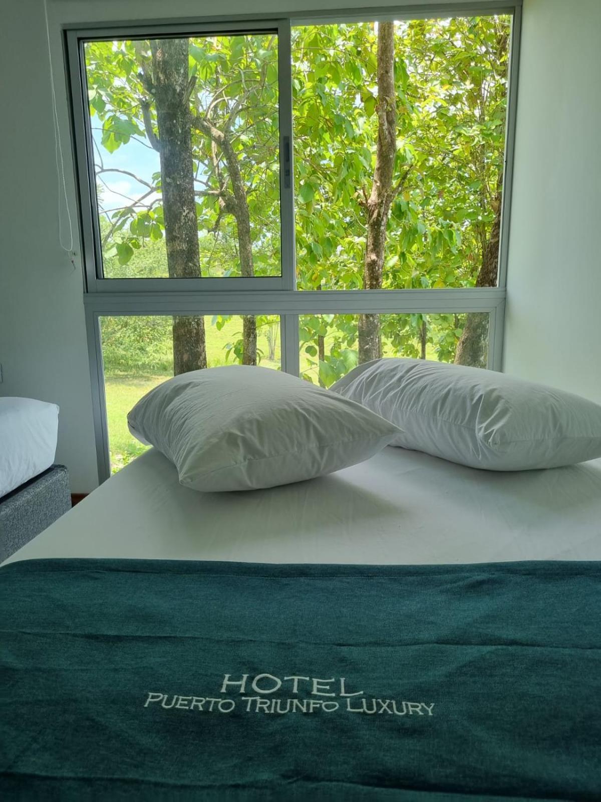 Hotel Puerto Triunfo Doradal Bagian luar foto
